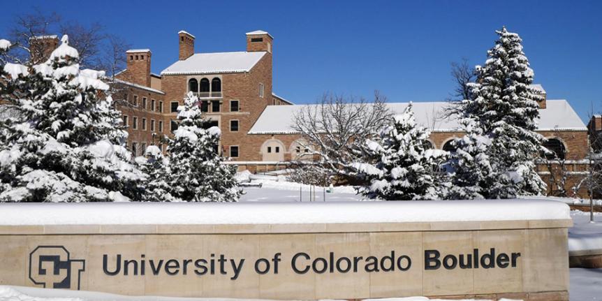 Snow-covered UMC & campus sign