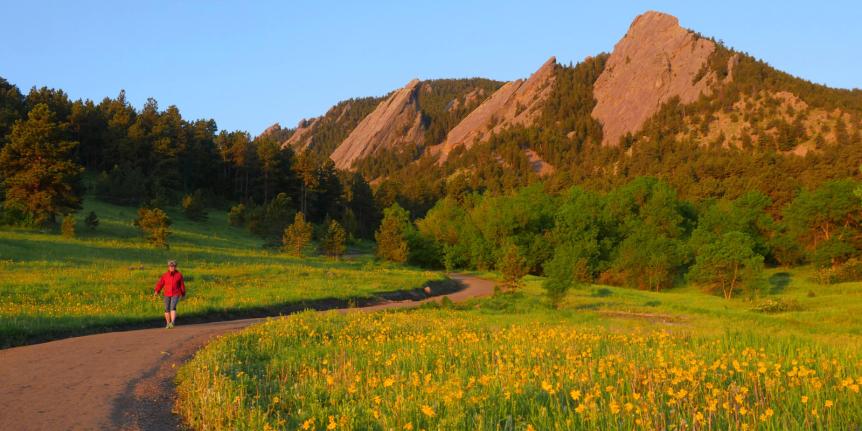 Photo of the flatirons during spring sunrise