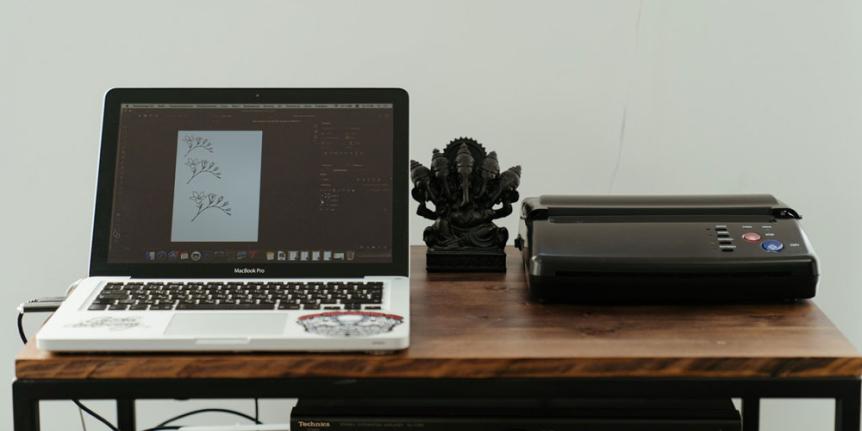 Laptop and personal printer.