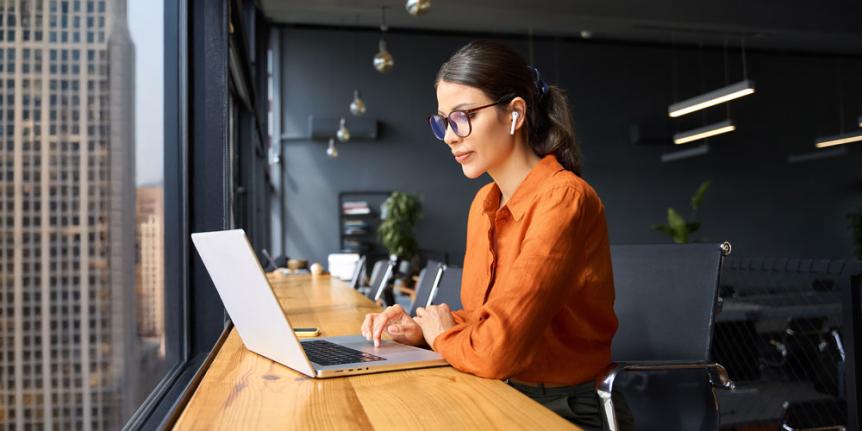 Woman working on laptop computer