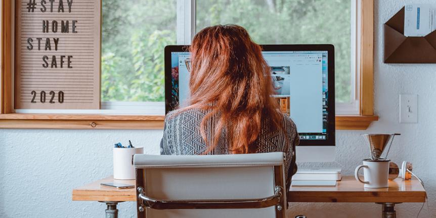 woman at home on computer