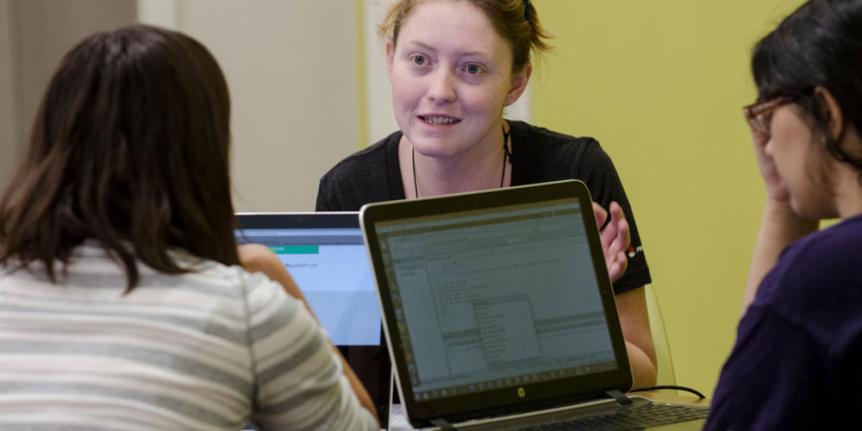 Students with laptop computers