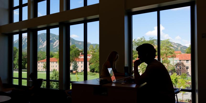 Students studying on CU Boulder campus